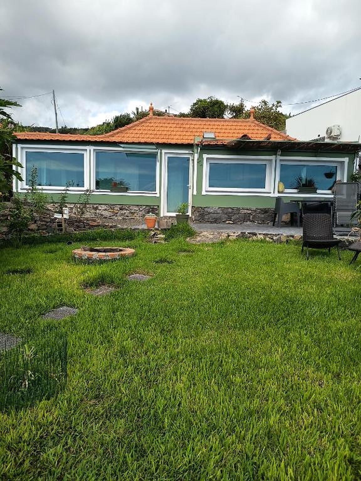 Exterior with garden and orange-tiled roof