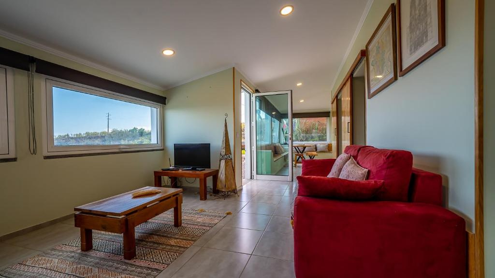 Living room with large window and natural light