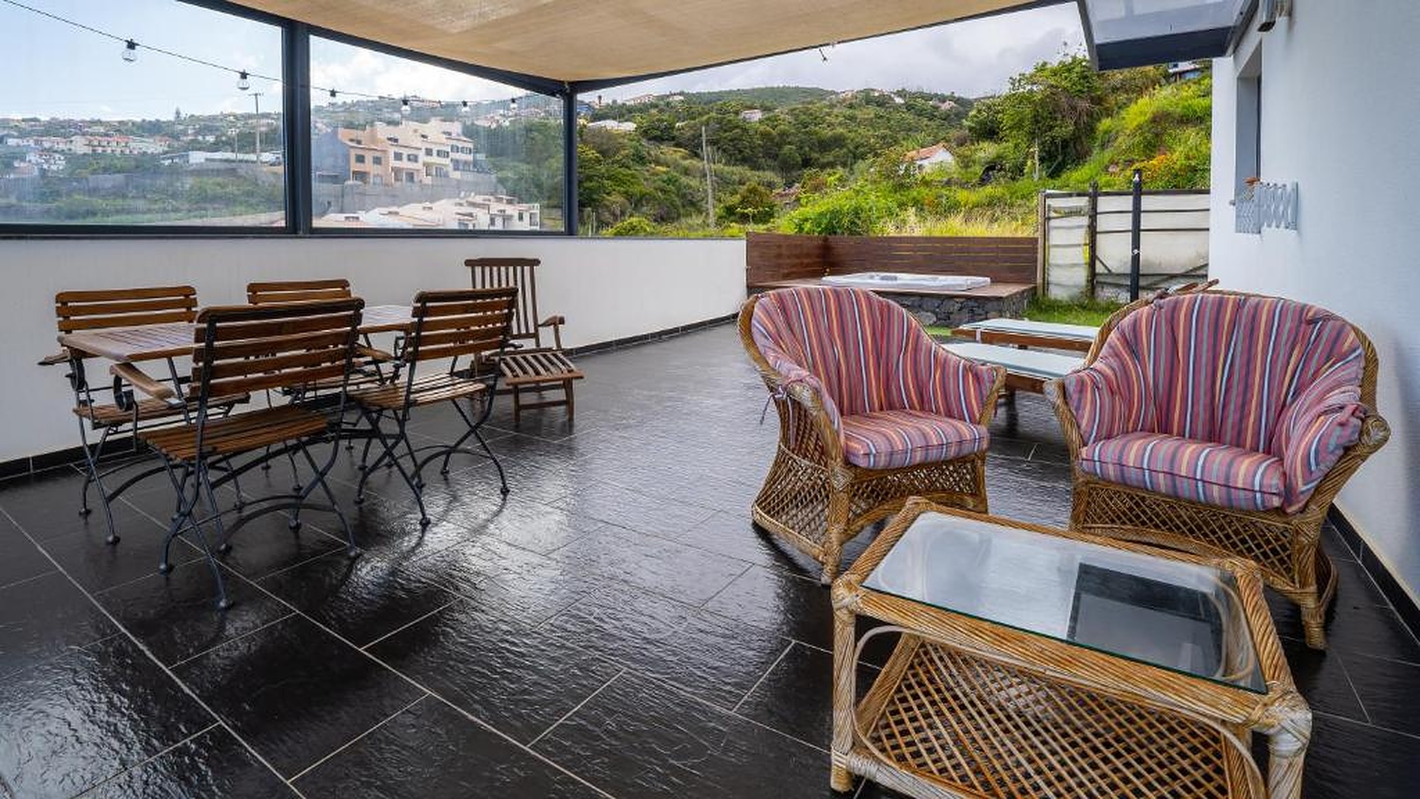 Terrace with dining table and lounge seating